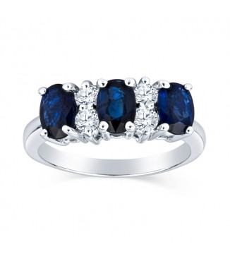 Luxurious Three Stone Oval Sapphire Ring With Round Two Stone Diamond Details