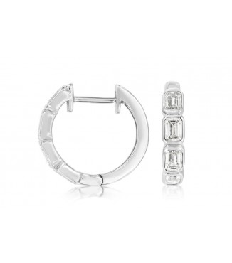 Discover the ultimate blend of modern elegance with our 14K White Gold Bezel Diamond Hoops. Each precisely cut diamond, securely set in a sleek bezel, captures and reflects light with dazzling brilliance, illuminating your every movement.  These exquisite
