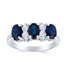 Luxurious Three Stone Oval Sapphire Ring With Round Two Stone Diamond Details