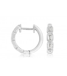Discover the ultimate blend of modern elegance with our 14K White Gold Bezel Diamond Hoops. Each precisely cut diamond, securely set in a sleek bezel, captures and reflects light with dazzling brilliance, illuminating your every movement.  These exquisite
